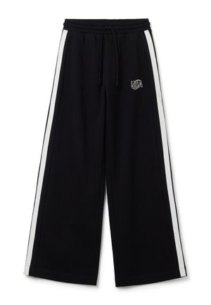 Pantaloni da jogging neri a gamba larga con strisce bianche laterali e vita elasticizzata. Presentano un cordino e il logo "USA" ricamato in bianco.