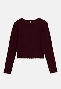 Long-sleeve, cropped top in deep burgundy ribbed fabric, featuring a round neck and scalloped hem. Soft texture with fitted design.