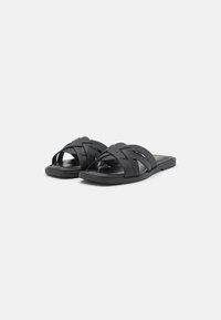 Tamaris Platt slip-in - black