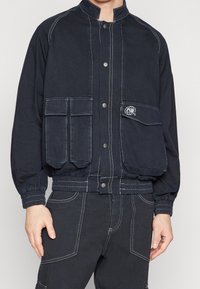 Night Addict Farkkutakki - grey