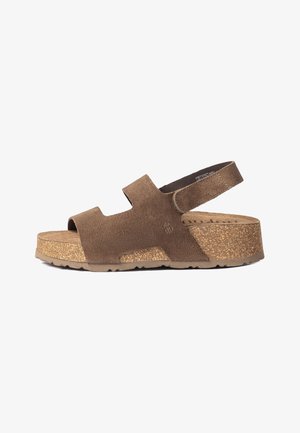 Brown suede open-toe sandal with adjustable ankle strap and cork platform sole, side view on white background.