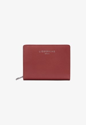 Red leather wallet featuring a smooth texture, silver embossed logo, and a zippered closure; minimalist rectangular design.