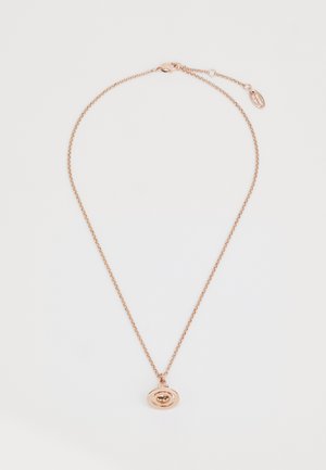 Roze gouden ketting met een fijne schakel en een ovale hanger met een centraal oogdetail. Gladde textuur, minimalistisch ontwerp, verstelbare lengte.