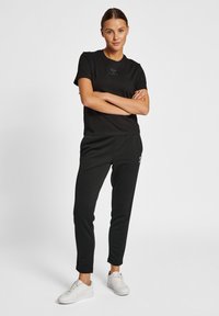 Hummel HMLICONS  - T-shirts basic - black