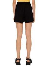 QS REGULAR AUS SEERSUCKER - Trainingsbroek - schwarz