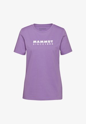T-shirt en coton violet à manches courtes et col rond. Présente un texte blanc indiquant "MAMMUT SINCE 1862" en évidence sur la poitrine.