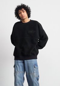 Carhartt WIP COORDINATE  - Suéter de forro polar - black/grey