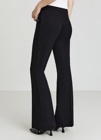 Calliope LUNGHI CON OCCHIELLI - Pantaloni - ultrablack