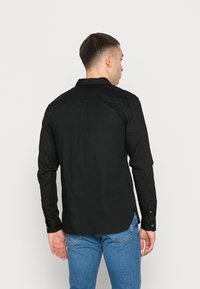 AllSaints HAWTHORNE - Camisa - black