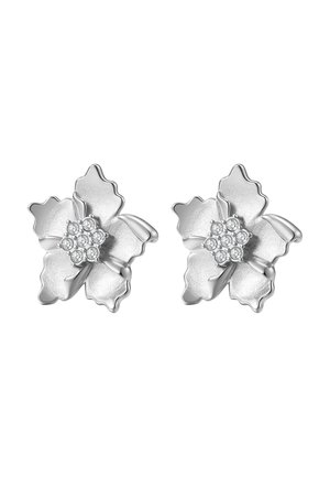 Pair of silver flower-shaped earrings with five textured petals and clusters of small clear gemstones at the center.