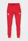 FC BAYERN MÜNCHEN DNA PANT - Tracksuit bottoms - power red