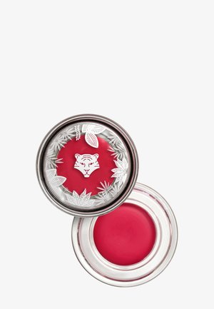 Okrągły szklany pojemnik z metalową pokrywką w kolorze srebrnym, wewnątrz którego znajduje się różowy krem. Pokrywka ozdobiona ilustracją tygrysa oraz wzorami roślinnymi.