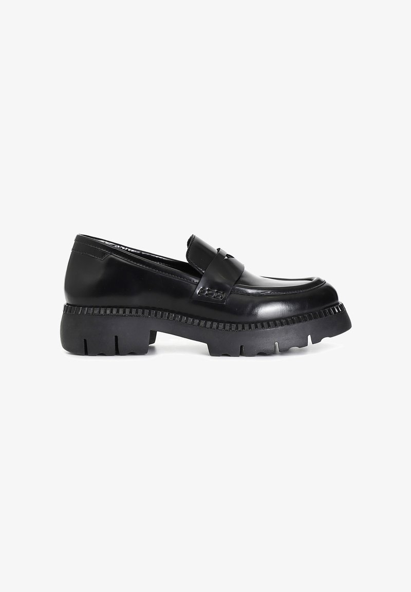Black loafers with a glossy patent finish, chunky rubber sole, and decorative strap across the vamp. The sole features a serrated edge.