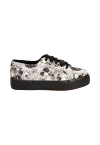 Black and white floral canvas sneakers with a textured upper, black rubber sole, and black laces. Features a red logo label on the side.