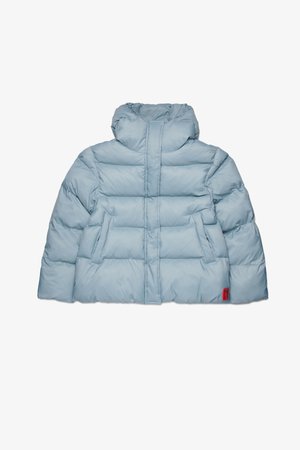 Light blue puffer jacket featuring a hood, side pockets, quilted pattern, and a red logo accent at the hem. Soft, smooth texture.