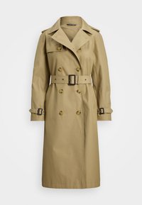 Beige trench coat yang terbuat dari kain halus, menampilkan desain double-breasted, kerah lebar, sabuk di pinggang, dan tali lengan yang dapat disesuaikan.