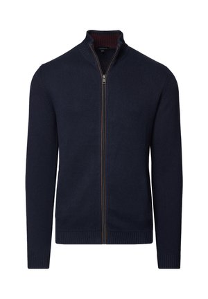 Granatowy dziany kardigan na całej długości zapinany na zamek błyskawiczny, z ściągaczami na mankietach, dole i kołnierzu, z brązową podszewką na wewnętrznej stronie kołnierza oraz metalowym zamkiem.