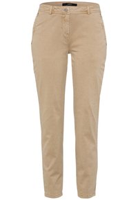 Pantalons chino beige en tissu mélangé coton, avec une coupe slim, des poches avant et une fermeture à bouton au niveau de la taille.