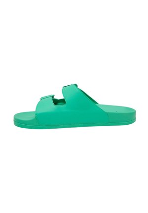 Green leather slide sandal with two adjustable straps, flat sole, and smooth texture. Features a rounded toe and minimalistic design.