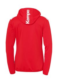 Red hoodie made from lightweight material. Features a white accent on the shoulders and "Kempa" logo in white on the back.