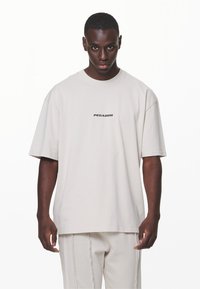 Pegador COLNE LOGO TEE - Apdrukāts T-krekls - washed dust cream