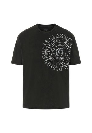 T-shirt en coton noir avec un grand motif circulaire blanc avec du texte et un logo sur le devant. Col rond classique et manches courtes.