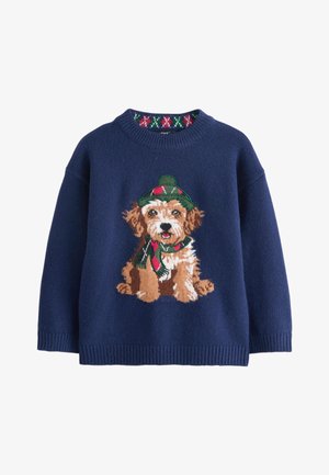 Marineblauer Pullover mit gerippten Bündchen und Saum, auf dem Vorderteil ist ein brauner und weißer Hund mit grünem und rotem Hut und Schal gestrickt.