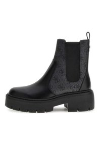 Stivale Chelsea in pelle nera con pannello in tessuto testurizzato; suola in gomma spessa; inserti elastici sui lati; punta arrotondata; linguetta sul tallone.