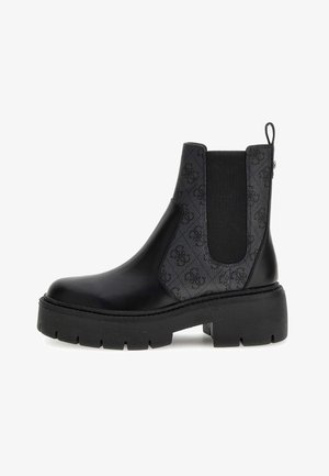 Stivale Chelsea in pelle nera con pannello in tessuto testurizzato; suola in gomma spessa; inserti elastici sui lati; punta arrotondata; linguetta sul tallone.