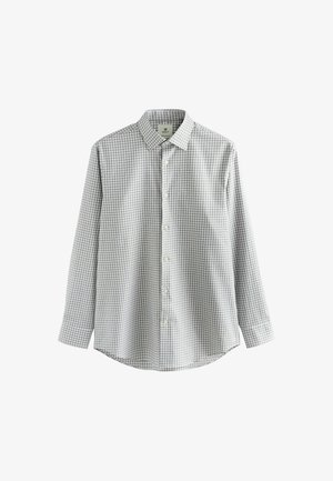Chemise à manches longues à carreaux gris et blancs avec un col boutonné et des boutons sur le devant, présentant un ourlet arrondi et une texture de tissu douce.