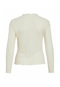 Top manica lunga in tessuto di pizzo avorio, con motivo floreale a rilievo, orlo smerlato e collo alto con un leggero colletto.