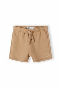 Pantaloni corti beige realizzati in tessuto morbido, con elastico in vita, cordino e un delicato design con faccina sorridente sulla parte frontale.