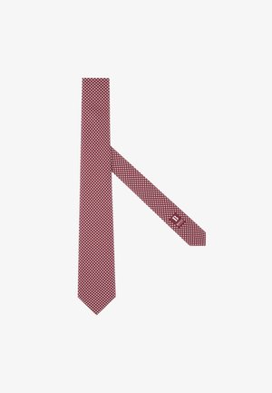 Rote Krawatte mit einem strukturierten Muster aus kleinen weißen Quadraten. Schmaler Schnitt mit spitzem Ende und Etikettendetail nahe dem schmalen Ende.
