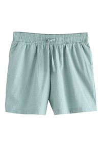 Shorts bleu clair en tissu texturé, avec une taille élastique munie d'un cordon de serrage et des poches latérales. Motif côtelé vertical présent.