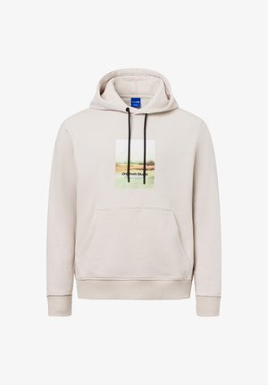 Beige hoodie made of soft fabric. Features a front pocket, black drawstrings, and a printed graphic with green and brown hues.