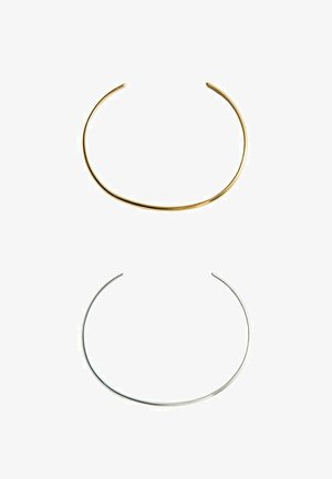 Two thin open cuff bracelets, one gold and one silver, displayed on a white background.