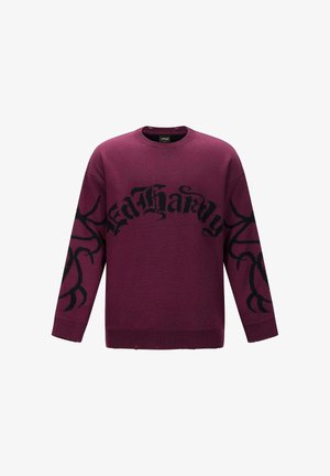 Maglione bordeaux con testo e motivi in stile tribale neri sul davanti e sulle maniche; colletto e polsini a costine.