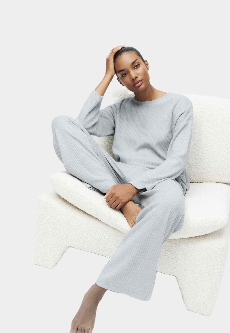 Pantaloni in maglia a trecce - Grigio chiaro mélange - DONNA | H&M IT Pantaloni in maglia a trecce - Grigio chiaro mélange - DONNA | H&M IT