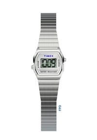 Stříbrné digitální hodinky Timex s kovovým řetízkem, zobrazující čas 10:09, označené jako voděodolné, s tlačítky pro režim a reset.
