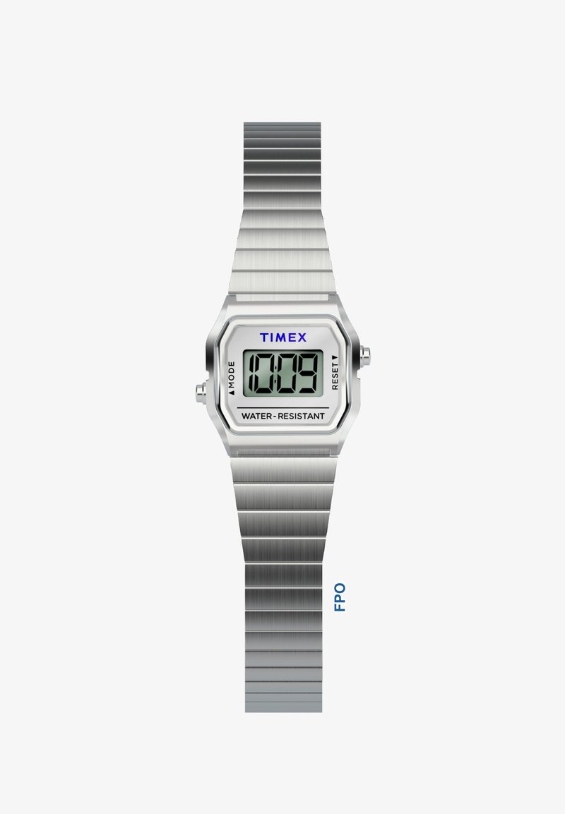 Stříbrné digitální hodinky Timex s kovovým řetízkem, zobrazující čas 10:09, označené jako voděodolné, s tlačítky pro režim a reset.