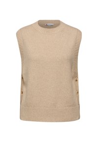 Mouwloze beige trui gemaakt van zachte breiwerk. Kenmerkt zich door ribbeltextuur bij de schouders en de zoom; decoratieve knopen aan de zijkant.