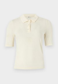 Korte ermer polo skjorte i lys gul, med klassisk krage og tre-knapps knapplacket. Glatt tekstur med en tettsittende design.