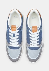 Blue and gray sneaker featuring mesh and suede materials, white laces, brown leather accent on the heel, and a round toe design.