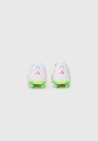 White soccer cleats with neon green soles. Features pink and blue accents, a textured upper, and three stripes logo on the back.