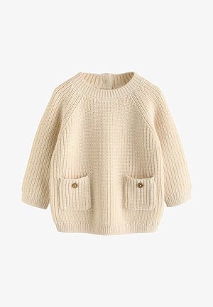 Strikket beige sweater med raglanærmer, rund halsudskæring og to forlommer. Hver lomme har en lille knapdetalje.