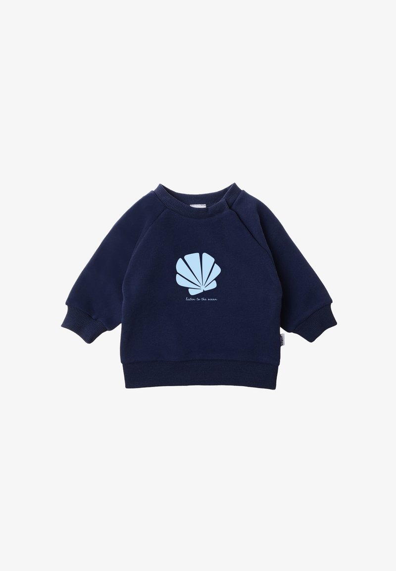 Navy blue sweatshirt featuring a light blue seashell graphic and text "listen to the ocean," with ribbed cuffs and hem. Soft fabric.