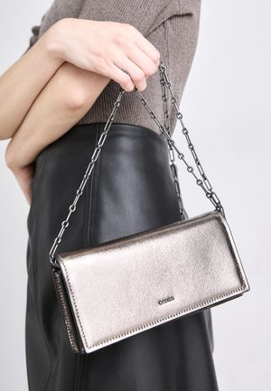 Calvin Klein GLOW CHAIN MINI BAG - Sac bandoulière - silver-coloured