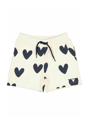 Bomuldsshorts med en cremefarvet baggrund og marineblå hjerteprint, med snor i taljen og sidelommer. Mærkeskilt på kanten.