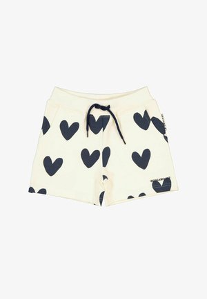 Bomuldsshorts med en cremefarvet baggrund og marineblå hjerteprint, med snor i taljen og sidelommer. Mærkeskilt på kanten.