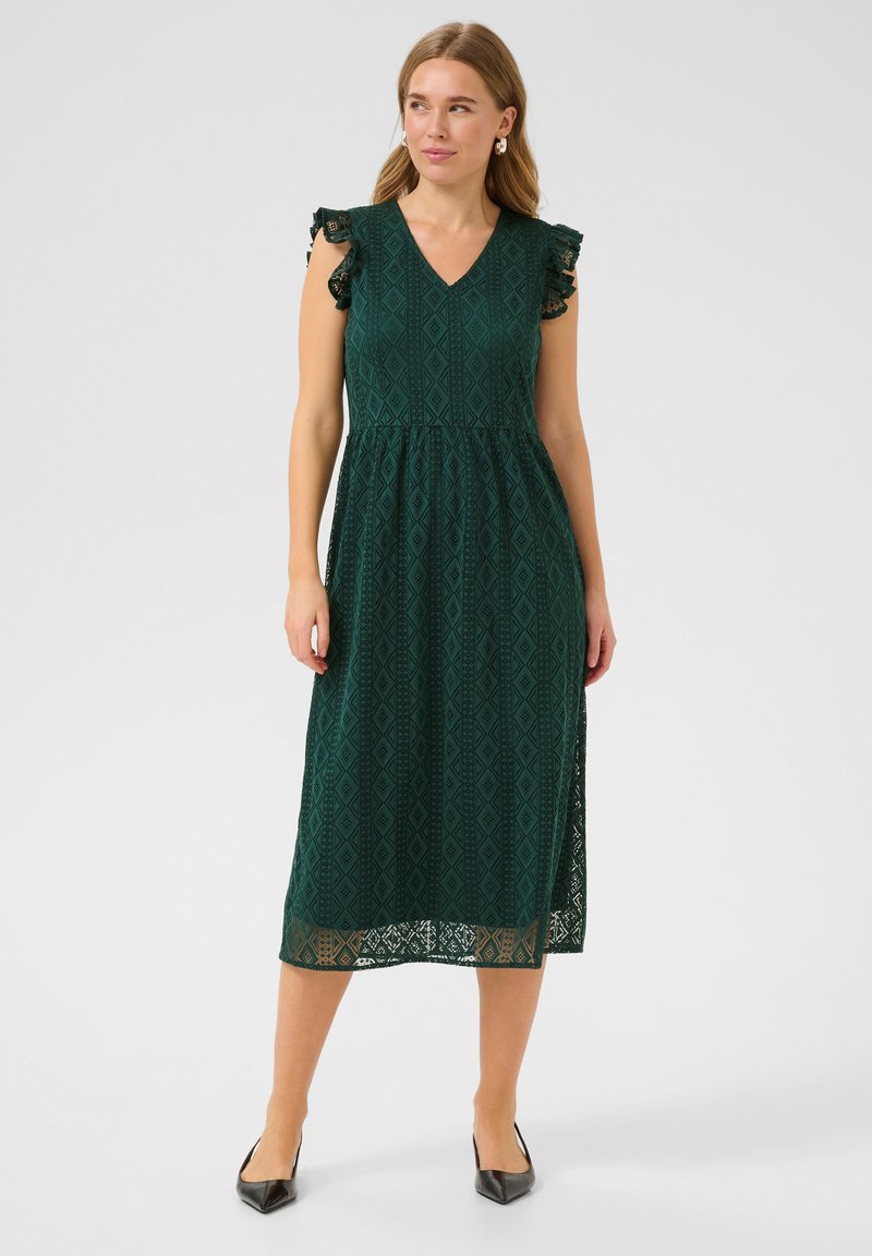 Dark green lace midi dress with a V-neck, ruffled sleeves, and diamond pattern. Features a fitted bodice and flowing skirt.